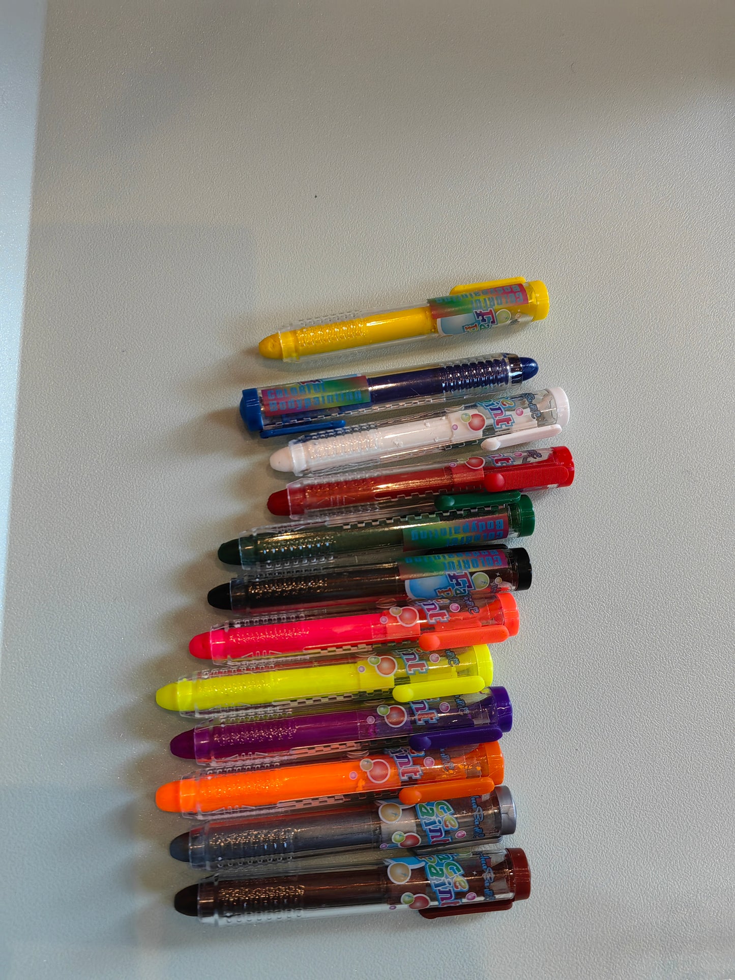 Alayjah, 12-Color Face & Body Paint Crayons, Safe, Non-Toxic Makeup Sticks for Kids & Adults, Easy to Apply & Wash Off20100020الايجاه، 12 لون من أقلام تلوين الوجه والجسم – مكياج آمن وغير سام للأطفال والكبار، سهل الاستخدام والغسل