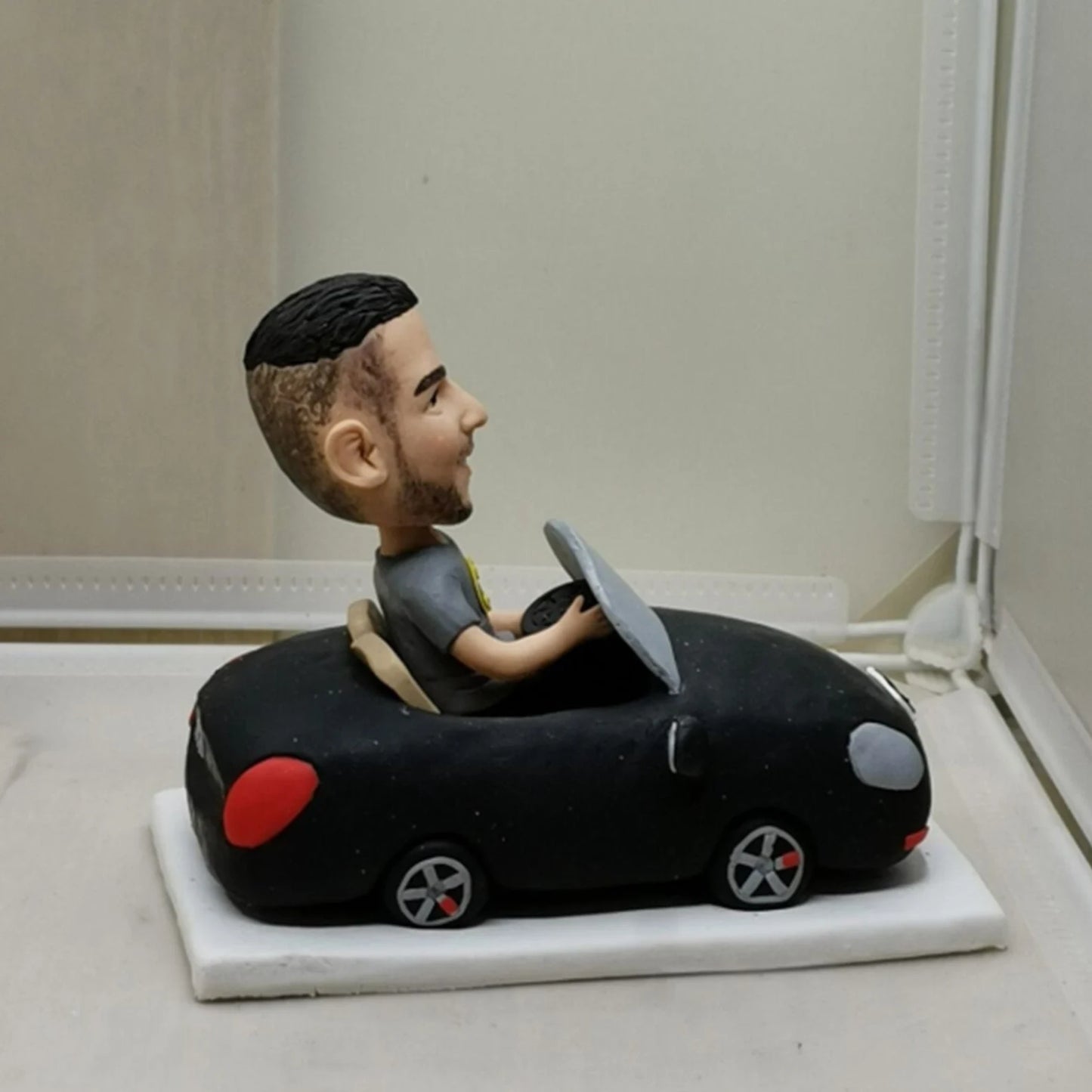 مجسم كاريكاتير لشخصيتك في سيارة  prototype customized caricature for your personality driving car