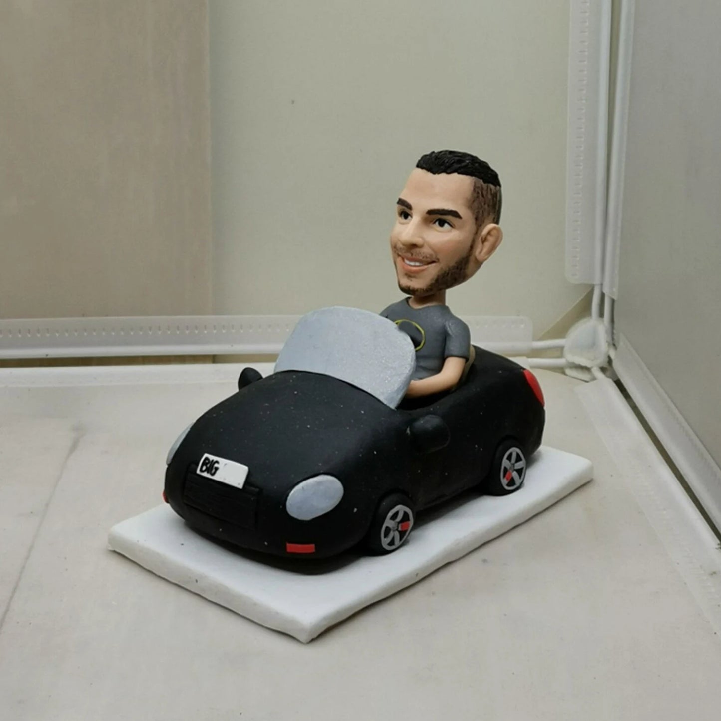 مجسم كاريكاتير لشخصيتك في سيارة  prototype customized caricature for your personality driving car